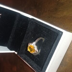 Elegant Silver Ring with Yellow Gemstone